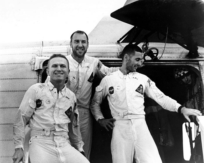 The crew of Apollo 8, stepping off the helicopter onto the deck of the Yorktown on their return home