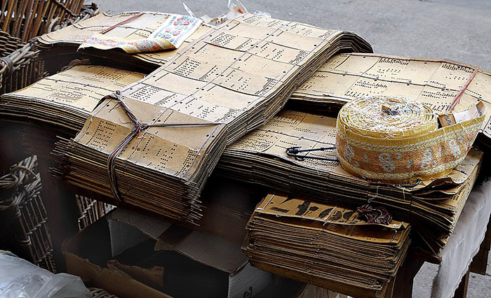 Punched cards for weaving machines, in the former textile factory (soft furnishings) Vanoutryve, rue du Phénix in Mouscron, Belgium