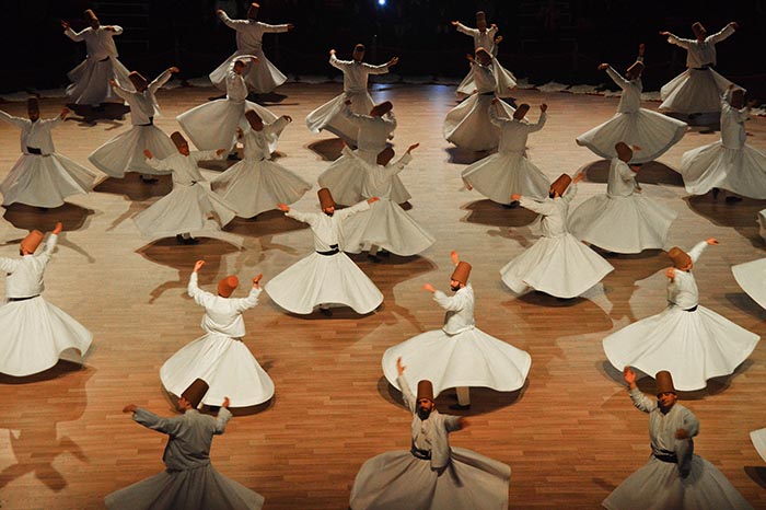 Sema show and dervishes, museum of Mevlana, dervishes spinning around with mystical music, Konya Turkey