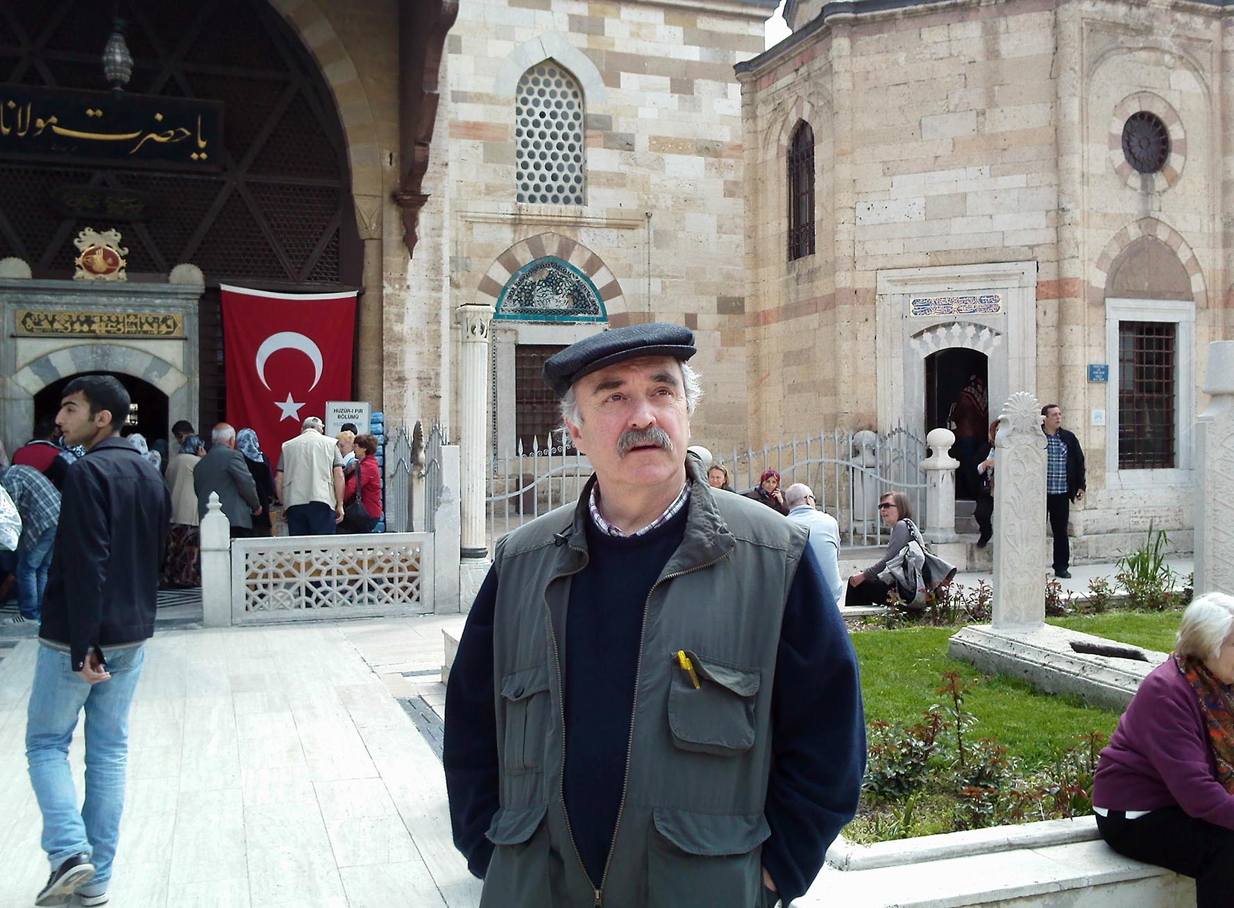 Christopher Ryan in front of Rumi's tomb in Konya