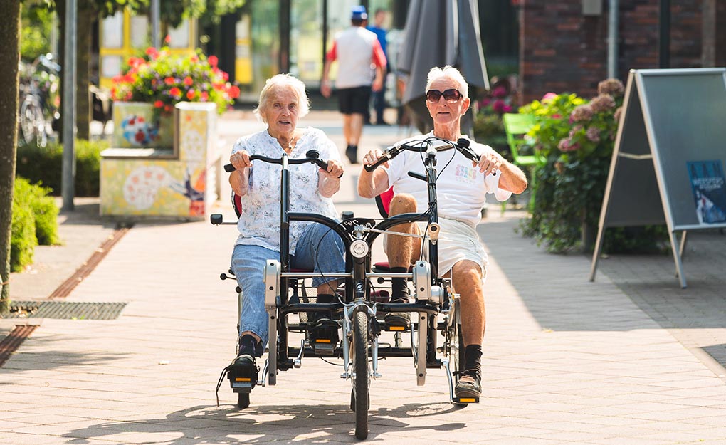 Cycling residents in the ‘dementia village’ at Hogeweyk in the Netherlands