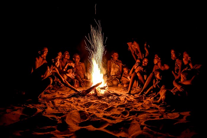 Bushmen of the Ju/' Hoansi-San sitting at the campfire