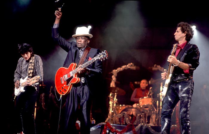 Bluesman John Lee Hooker performs onstage with the Rolling Stones in Atlantic City