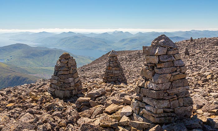 Stone cairns on the summit of Ben Nevis, Scottish Highlands, Scotland