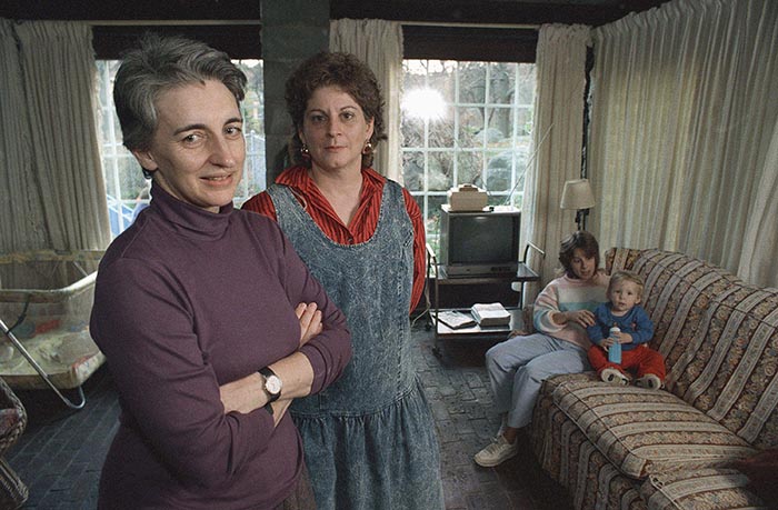 Rosemary Haughton, foreground, and Donna Loria, a housing specialist, in the living room of Wellspring house in 1987