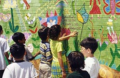 Children painting a wall